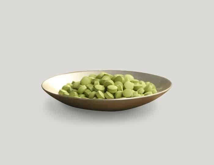 Bowl of moringa tablets