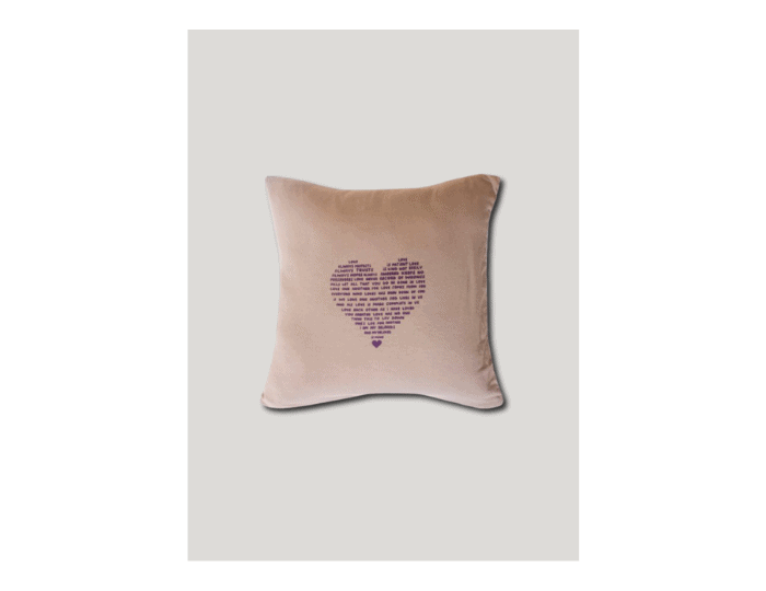 Pink cushion case decorated with heart
