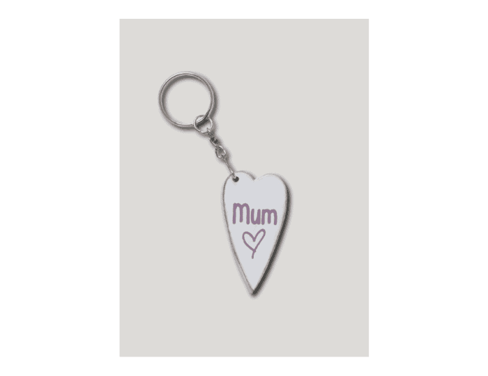 Keychain in heart shape with word mum written on it